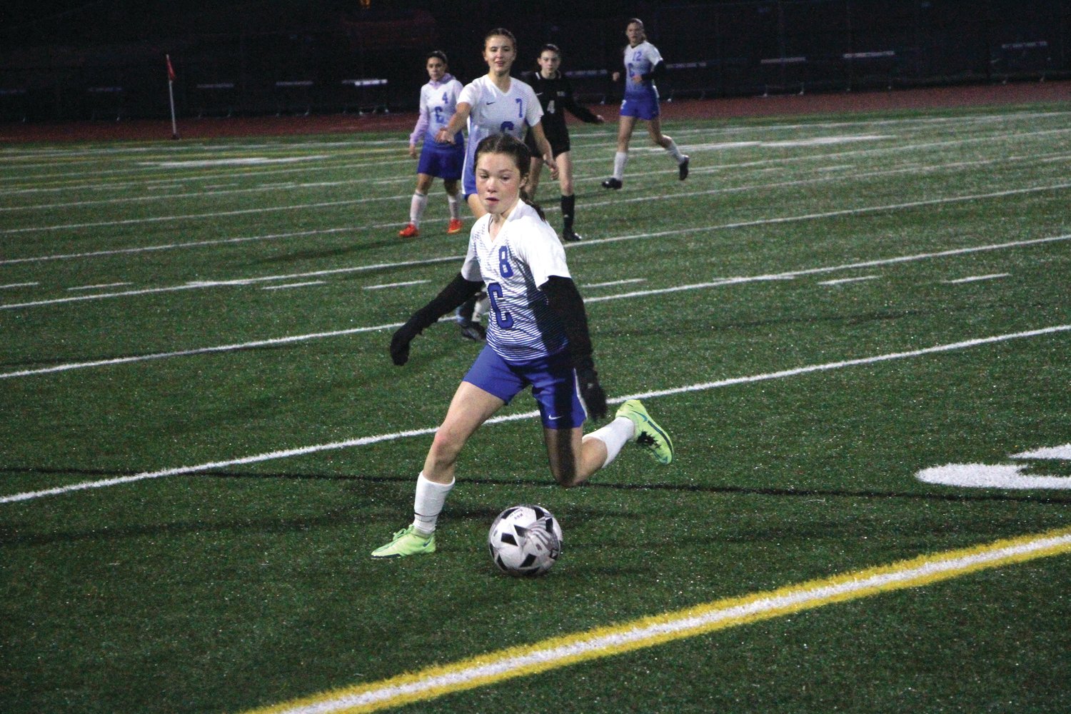Rising junior midfielder Ava Shiflett dribbles onward in an away matchup against Klahowya Secondary School last year. Shiflett was a crucial part of EJ’s potent offense last year, linking passes from the backfield to Rivals scorers.